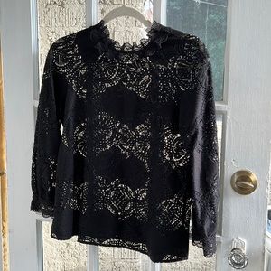 Beautiful lace sezane top. Hate to part with it, but I need more space!